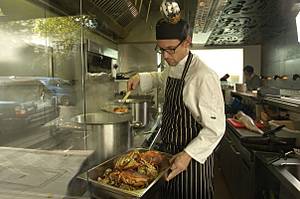 Chef Tom Pemberton at work in his new restaurant, Hereford Road